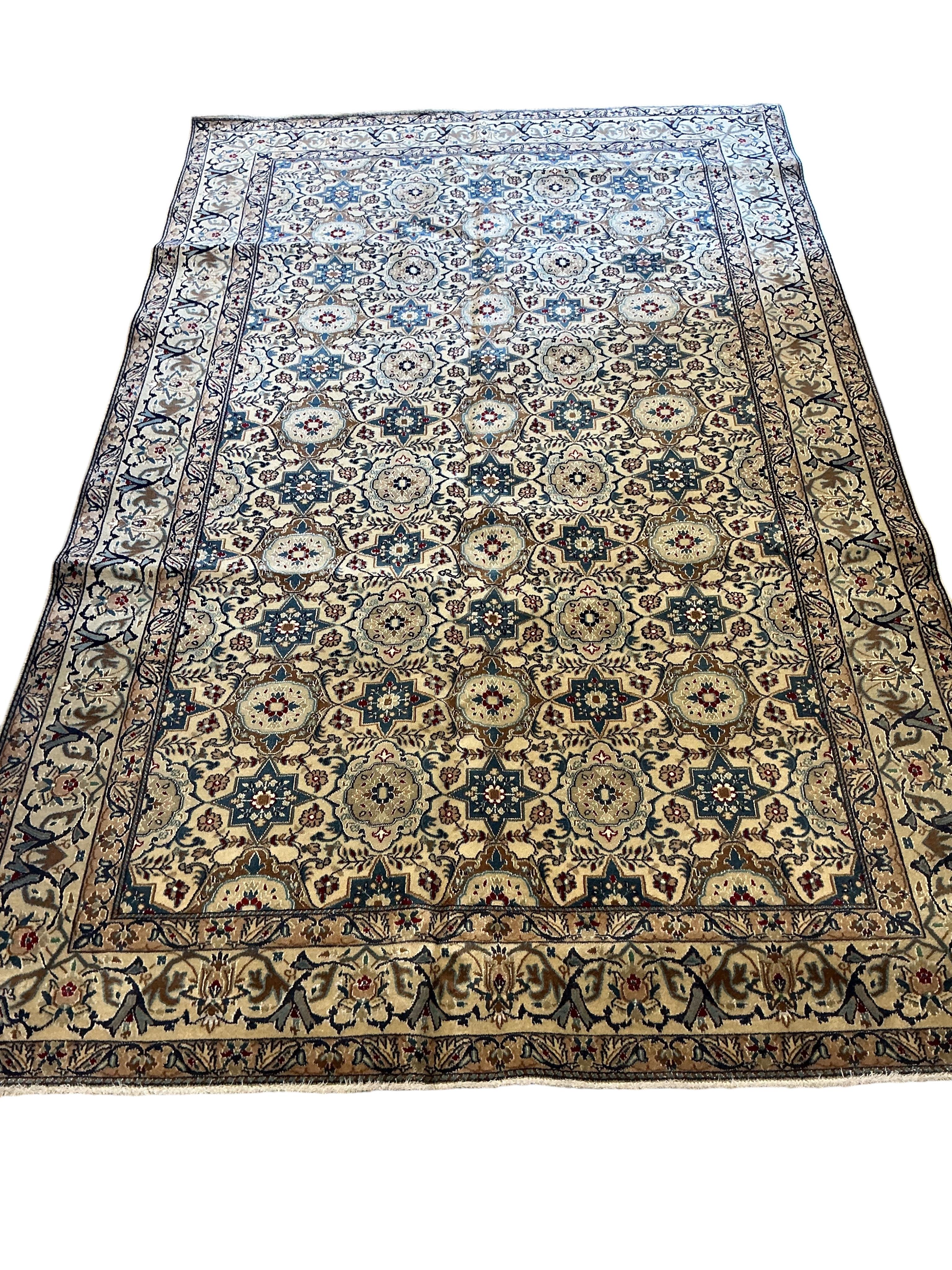A Nain ivory ground carpet, 267 x 165cm